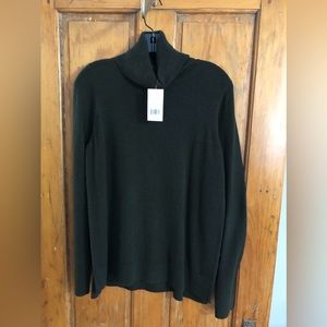 Vince Cashmere side slit turtleneck sweater.

Size M